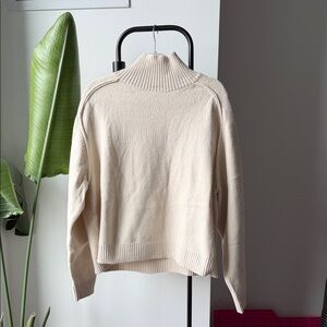 Cream Turtleneck Sweater